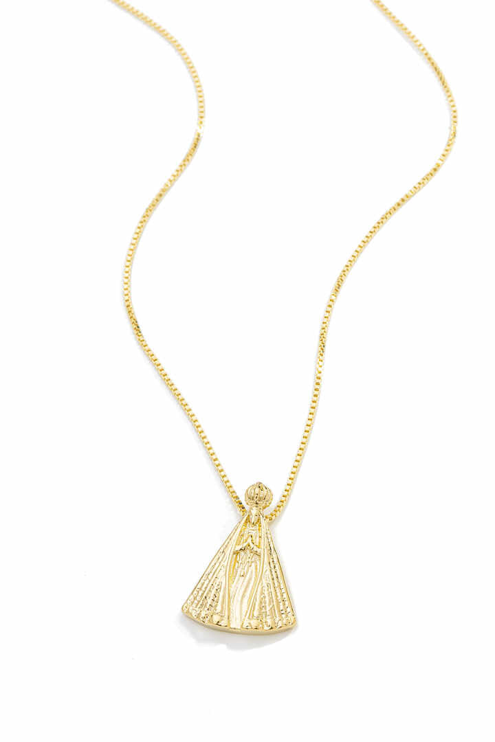 Pingente - Pingente Nossa Senhora Aparecida Polido Carregue sempre consigo a proteção e o amor de Nossa Senhora Aparecida com este pingente polido e delicado