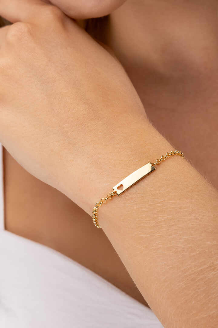Pulseira - Pulseira Elo Português com plaquinha e Coração Vazado – 15 cm Pulseira em malha elo português com plaquinha abaulada e coração vazado.
