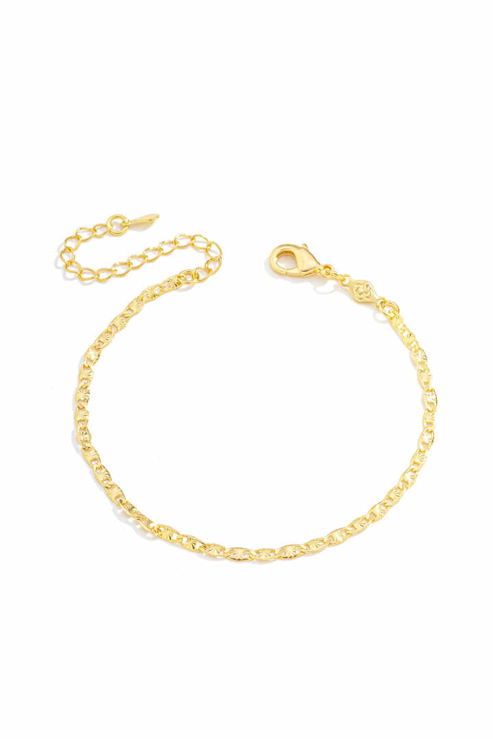 Pulseira - Pulseira Piastrini Diamantada 16cmDelicada e sofisticada, esta pulseira piastrini diamantada de 16cm possui malha fina e achatada com acabamento diam